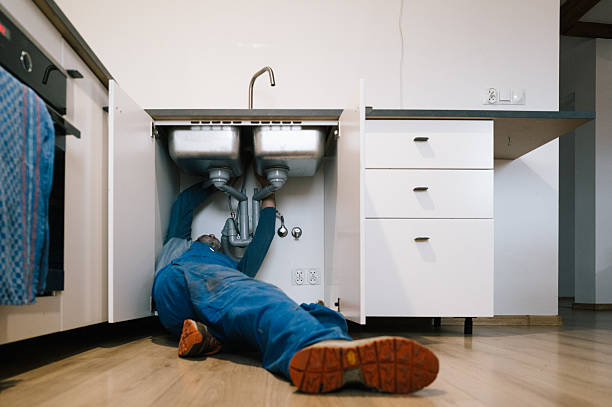 Professional Emergency Plumber technician working in North Reading, MA